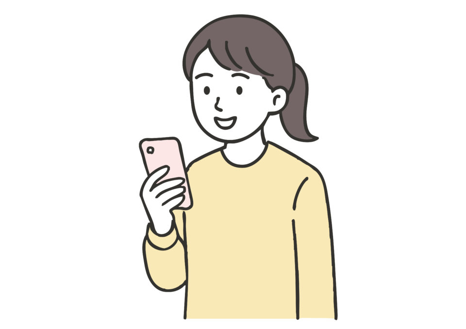 スマホを見る女性